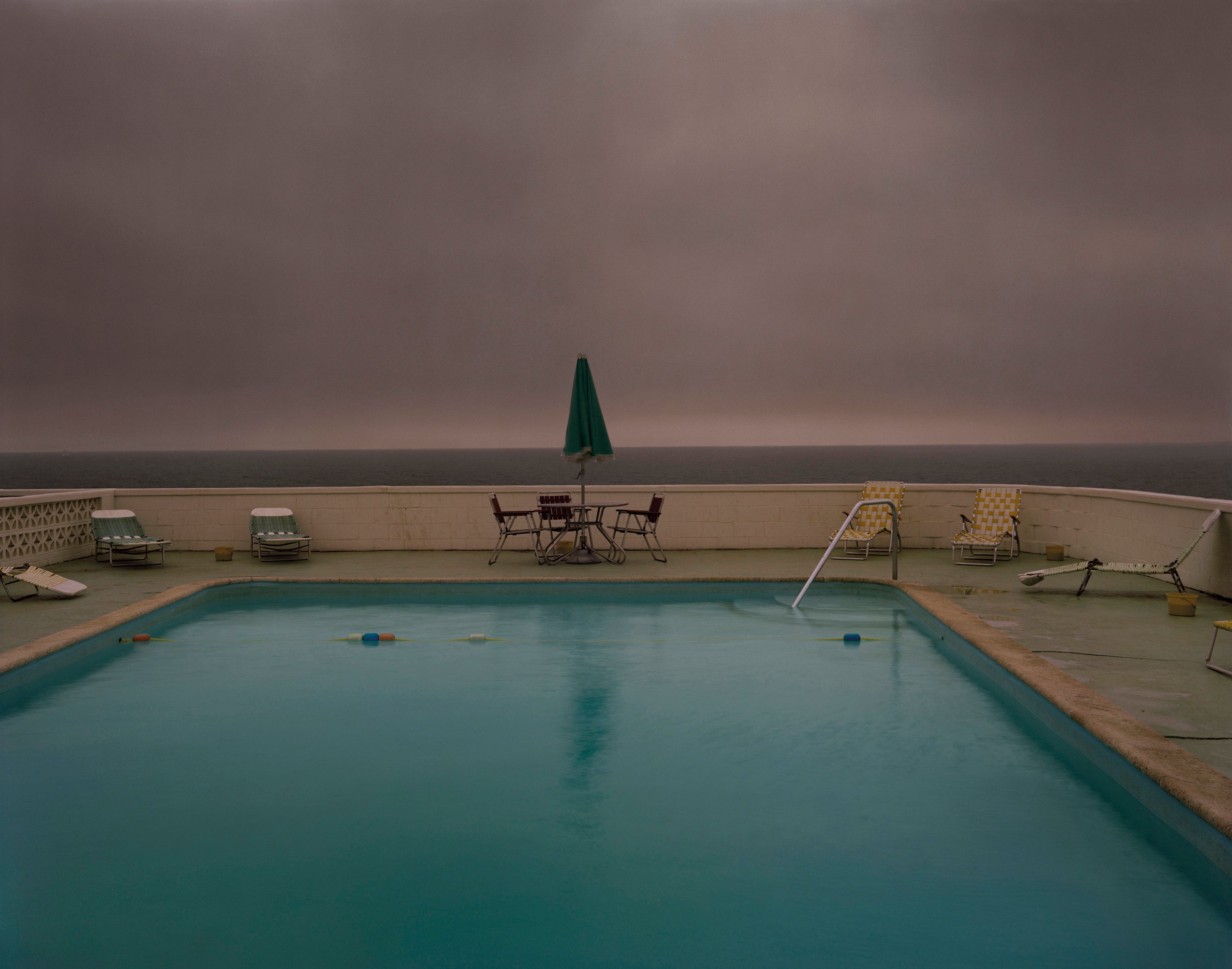 Joel Meyerowitz: Pool, Storm, Provincetown, Massachusetts, 1976