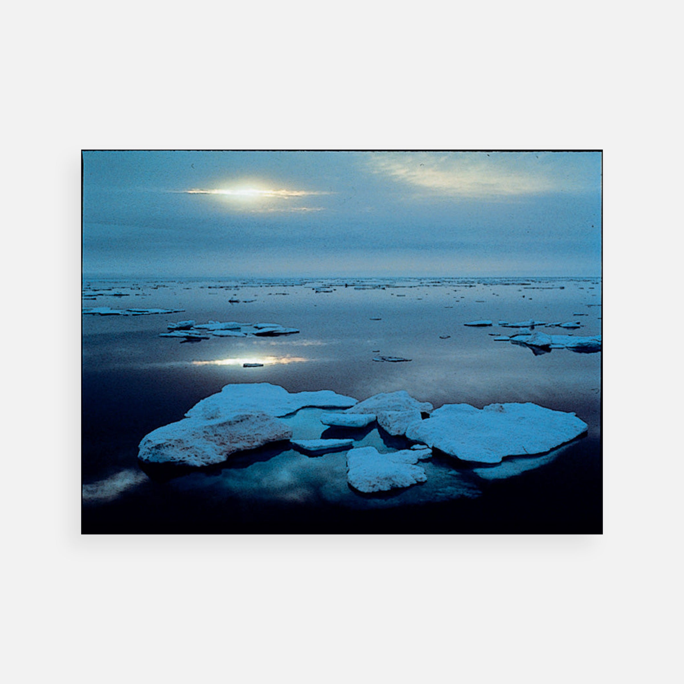 Robert Glenn Ketchum: Dead-calm sunset before the storm, Larsen Sound, 1994